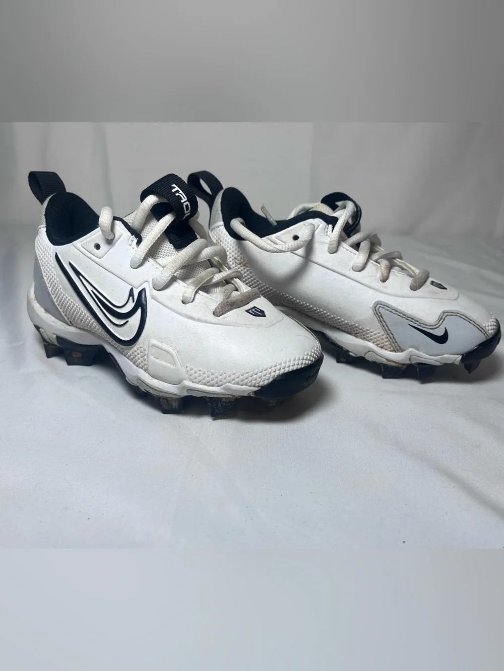 Nike Kids White and Black Cleated Sneakers